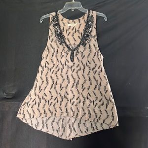 Silky tunic with bead detail. Size M